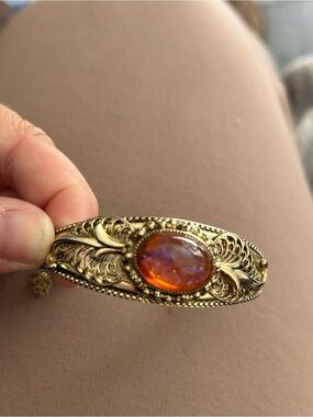 Whiting and Davis- Gold dragon breath Bracelet with pink Cabochon Stone